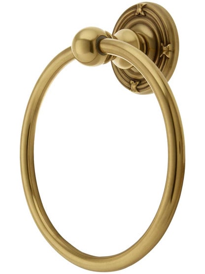 Brass Towel Ring with Ribbon and Reed Rosette in Antique Brass.